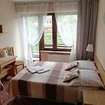 Quarto em Acomodações Particulares Arnika Wynajem Pokoi